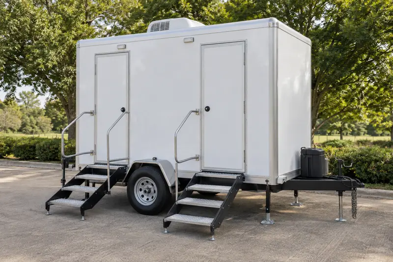 Restroom trailer with entry steps